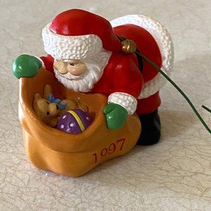 DCI Santa Claus Peeking In Sack Of Toys Christmas Ornament 2.25" (1997-USED)